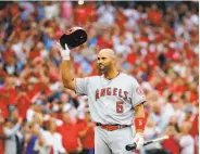  ?? Dilip Vishwanat / Getty Images ?? The Angels’ Albert Pujols, formerly of the Cardinals, acknowledg­es an ovation in St. Louis.