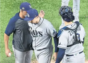  ?? MAXX WOLFSON GETTY IMAGES ?? After allowing just two hits on 73 pitches, Rays starter Blake Snell was pulled by manager Kevin Cash in the sixth inning of Game 6 to avoid facing the Dodgers order a third time.