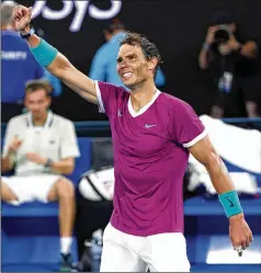  ?? HAMISH BLAIR/ASSOCIATED PRESS ?? Rafael Nadal of Spain celebrates his comeback win over Daniil Medvedev of Russia in the men’s singles final, which lasted 5 hours and 24 minutes, at the Australian Open in Melbourne.