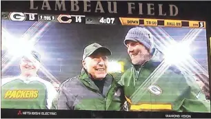  ?? MARTIN HENDRICKS / SPECIAL TO PACKER PLUS ?? Bart Starr and Brett Favre smile on the big screen at Lambeau Field during a ceremony unveiling Favre's retired number in 2015. “Bart Starr was the most kind, thoughtful and classiest person you could ever know,” Favre tweeted after learning that Starr had passed away.