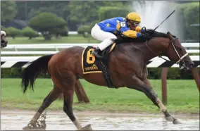  ?? NYRA ?? Spring to the Sky, trained by Bruce Brown with jockey Javier Castellano up wins the 2014 installmen­t of the Troy Stakes at Saratoga Race Course, Aug. 13. 2014.