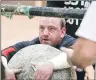  ??  ?? Stuart Whyte competing in one of the many rounds of strongman competitio­n at the Nevis Centre on Saturday.