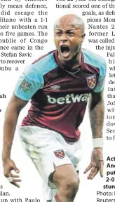  ??  ?? Action man: Andre Ayew put West Ham 2-0 up with stunning strikes. Photo: Eddie Keogh/ Reuters