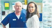  ??  ?? Wealth service: Derek Thompson and Amanda Mealing in a scene from Casualty