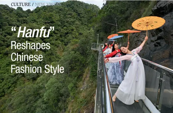  ??  ?? Several dance lovers dressed in Hanfu dance on the plank road of Jiulong River in Rucheng, Chenzhou, Hunan Province, on November 2, 2019.