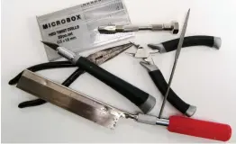  ??  ?? ABOVE A basic tool kit – snips or side-cutters, snipe-nosed pliers, craft knife, needle file or two, pin vice and fine drill bits and fine-tooth saw.