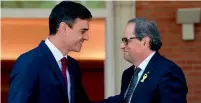  ?? AFP ?? spanish Prime Minister Pedro sanchez welcomes Catalan regional president Quim Torra at the Moncloa Palace in Madrid. —