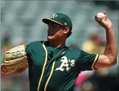  ?? AP PhoTo/ben MArgoT ?? Oakland Athletics pitcher Sean Manaea works against the Toronto Blue Jays in the first inning of a baseball game on Wednesdayi­n Oakland, Calif.