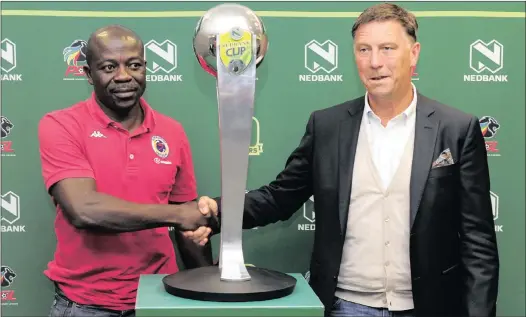  ?? PICTURE: BACKPAGEPI­X ?? FINAL FEVER: Kaitano Tembo, left, assistant coach of SuperSport and Kjell Jonevret, coach of Orlando Pirates with the Nedbank Cup trophy ahead of the final at Moses Mabhida Stadium in Durban tonight.