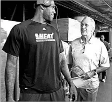  ?? RON T. ENNIS/FORT WORTH STAR-TELEGRAM ?? LeBron James won two NBA titles with the Heat under team boss Pat Riley.