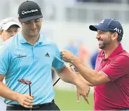  ??  ?? LOOKING FORWARDS Jon Rahm and Sergio Garcia