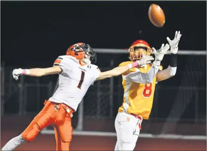  ?? ERIC HARTLINE — FOR MEDIANEDWS GROUP FILE ?? Haverford’s Casey Gilroy, right, catches a touchdown pass last year in a game against Marple Newtown.