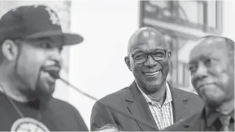  ?? Mark Mulligan / Houston Chronicle ?? Former Rocket and BIG3 commission­er Clyde Drexler, center, joins league co-founder Ice Cube, left, and Mayor Sylvester Turner in celebratin­g the arrival of BIG3 games to Houston.