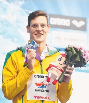  ??  ?? HE’S BACK: Mitch Larkin poses with his men's 200m individual medley silver medal.