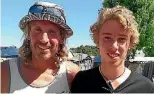  ?? PHOTO: STUFF ?? Alan Bruce and his son, Lachlan, saved three people from drowning at Kaiteriter­i Beach. Bruce suffered exhaustion and heat-stroke after his efforts.
