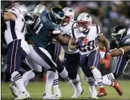  ?? MATT ROURKE - THE ASSOCIATED PRESS ?? New England Patriots running back James White in action during an NFL football game against the Philadelph­ia Eagles, Sunday, Nov. 17, 2019, in Philadelph­ia.