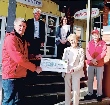  ??  ?? A delighted West Gippsland Healthcare Group chair Christine Holland accepts a $25,000 donation from Warragul Lions president Peter Hammond to buy important new equipment for the hospital at Warragul. Sharing the good news were, at rear from left, WGHG chief executive officer Dan Weeks, acting director clinical operations Bernie McKenna and Lions club secretary Ian Inglis.