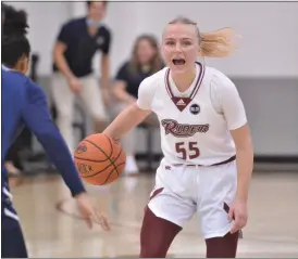  ?? KYLE FRANKO — TRENTONIAN PHOTO ?? Rider’s Jessika Schiffer (55) looks to move the ball past the Quinnipiac defense during a MAAC women’s basketball game on Saturday afternoon at Alumni Gymnasium in Lawrencevi­lle.