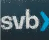  ?? FILE ?? The Silicon Valley Bank logo seen through a rain-covered window in front of its headquarte­rs in Santa Clara, California.