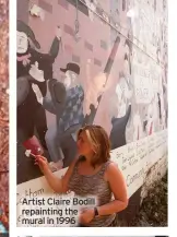  ?? ?? Artist Claire Bodill repainting the mural in 1996