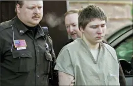  ?? THE ASSOCIATED PRESS ?? In this file photo, Brendan Dassey, is escorted out of a Manitowoc County Circuit courtroom in Manitowoc, Wis.
