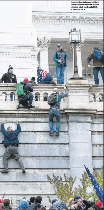  ?? ?? Insurrecti­onists looking to block certificat­ion of President Biden’s election climb west wall of U.S. Capitol on Jan. 6.