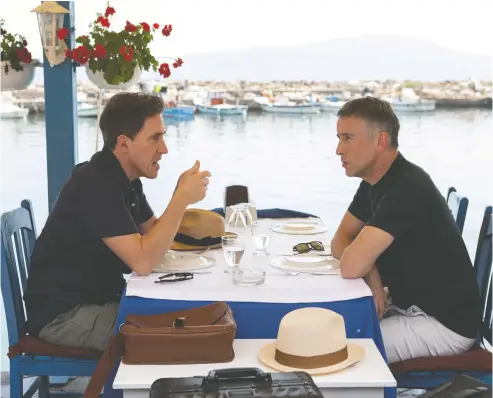  ?? ELEVATION PICTURES ?? Actors Rob Brydon, left, and Steve Coogan are sharing laughs and fine meals once again in The Trip to Greece