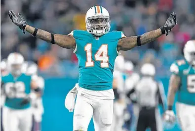  ?? JIM RASSOL/STAFF FILE PHOTO ?? The Dolphins have given wide receiver Jarvis Landry and his agent permission to explore potential trades.