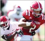  ?? RAY CHAVEZ — BAY AREA NEWS GROUP, FILE ?? St. Mary’s Julian Womack- Batzdorf ( 2) tries to break a tackle by Vallejo’s Jaquan Edwards during their September 2019 game in Albany.