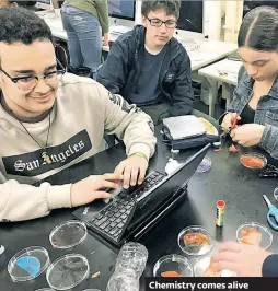  ??  ?? Chemistry comes alive at the small but mighty Humanities Preparator­y Academy in Manhattan.