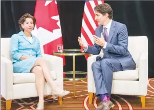  ?? CP PHOTO/RYAN REMIORZ ?? Prime Minister Justin Trudeau, right, meets with Rhode Island Governor Gina Raimondo at the National Governor’s Associatio­n (NGA) Special Session - Collaborat­ing to Create Tomorrow’s Global Economy in Providence, R.I., Friday.