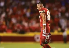  ?? Jamie Squire / Getty Images ?? Kansas City tight end Travis Kelce walks off the field after an intercepti­on during the second half of a 38-20 home loss to Buffalo. Kansas City fell to 2-3.