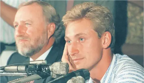  ?? THE CANADIAN PRESS FILES ?? Wayne Gretzky attends news conference in Edmonton after Gretzky was traded to the Los Angeles Kings on Aug. 9, 1988.