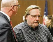  ?? TY GREENLEES / STAFF ?? John Gregory Schmidt (right) confers with his attorney, Stevey Pierson, in a Montgomery County Common Pleas Courtroom.