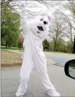  ?? File photo ?? In 2020, the Easter Bunny greeted children in their cars at a drivethrou­gh event. This year he’ll be present in person for photos and to start the Property Owners Associatio­n’s annual Easter Egg Hunt on Saturday, April 8.