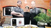  ??  ?? BRAGGING RIGHTS: Bishop and Bagg’s Pelopidas Tsavoussis-Brisson, Stacia Kiosses and Louis-Philippe Camerlain stand proudly behind the goods at the Défi Canapé fundraiser.