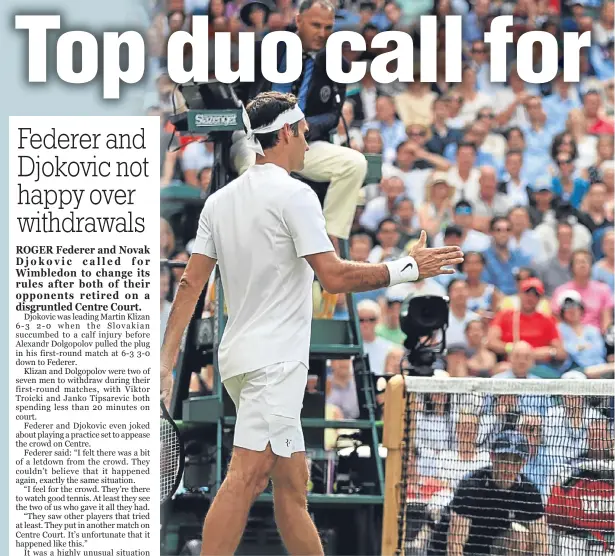  ??  ?? Roger Federer and Alexandr Dolgopolov shake hands at the end of their shortened encounter during their