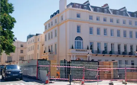  ??  ?? Building site: Work on creating the garden at Christian Candy’s mansion in Regent’s Park. Right: The property developer with his wife Emily