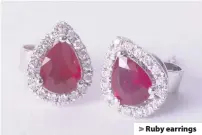  ??  ?? > Ruby earrings