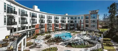  ?? Berkadia ?? MLG Capital purchased The Belvedere Springwood­s Village in Spring from Martin Fein Interests. The 342-unit apartment mid-rise at 2323 E. Mossy Oaks Road was built in 2014.
