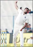  ?? (AFP) ?? In this file photo, India’s Ravichandr­an Ashwin bowls during the fourth day of the second Test match between India and New Zealand at the Eden Gardens Cricket Stadium in Kolkata on
Oct 3.