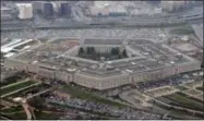  ?? PHOTOS BY THE ASSOCIATED PRESS ?? FILE - In this 2008 file photo, the Pentagon is seen in this aerial view in Washington. President Donald Trump says he will bar transgende­r individual­s from serving “in any capacity” in the armed forces. Trump said on Twitter Wednesday, July 26, 2017,...