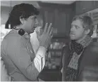  ??  ?? Director and producer M. Night Shyamalan, left, and Rupert Grint chat on the set of “Servant.”