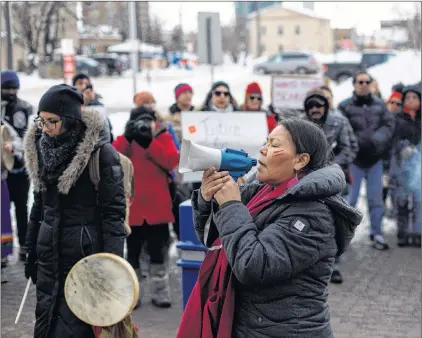  ?? JASON FRANSON/THE CANADIAN PRESS ?? A chant is performed during a rally in Edmonton in response to Gerald Stanley’s acquittal in the shooting death of Colten Boushie, Feb. 10.
