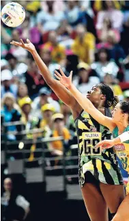  ?? FILE ?? Jamaica’s Jhaniele Fowler-Reid (left) in action against Australia’s Sharni Layton in a 2015 World Cup match. Jamaica and Australia will be among the top teams in the Commonweal­th Games netball competitio­n.