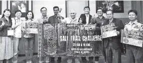  ??  ?? Tengku Adlin (fifth right) flanked by Jerry (fourth right) and Dr Anbarasu after the press conference announcing this year’s Salt Trail Challenge. Also seen is Sabah Parks assistant director (enforcemen­t and operation) Maipol Spait (second right).