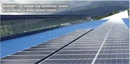  ??  ?? BUSKOWITZ has installed solar photovolta­ic systems on the rooftops of several gasoline stations.