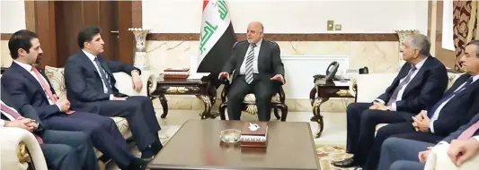  ??  ?? Prime Minister Haider Abadi, center, in a meeting with Nechirvan Barzani, 2nd from left, prime minister of Iraq's Kurdistan Regional Government, at his Baghdad office on Saturday. (AFP)
