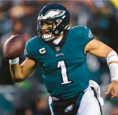  ?? MATT ROURKE/AP ?? The Eagles’ Jalen Hurts and Chiefs’ Patrick Mahomes, below, will be the first Black quarterbac­ks to face off in the Super Bowl.