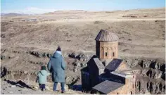  ?? ?? A woman walks near Tigran Honents Church in Ani ruins near Kars.